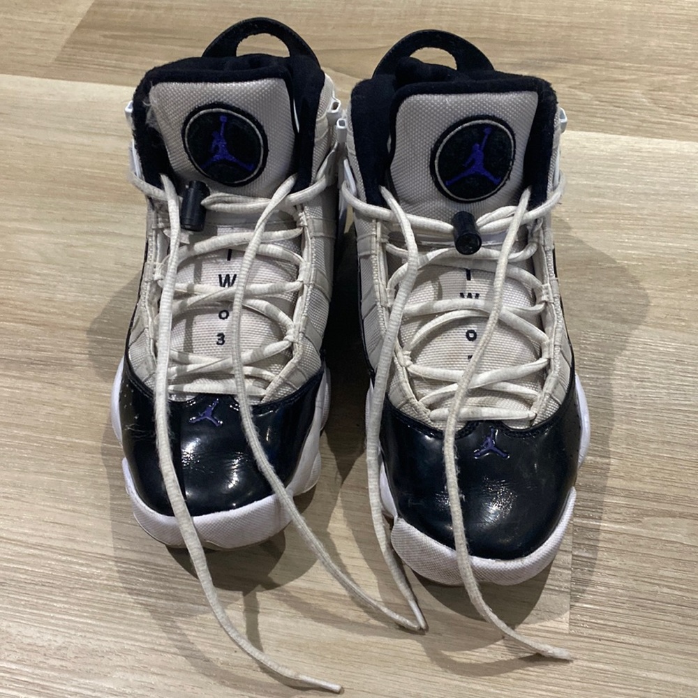 Jordan 11’s trey white/dark concord